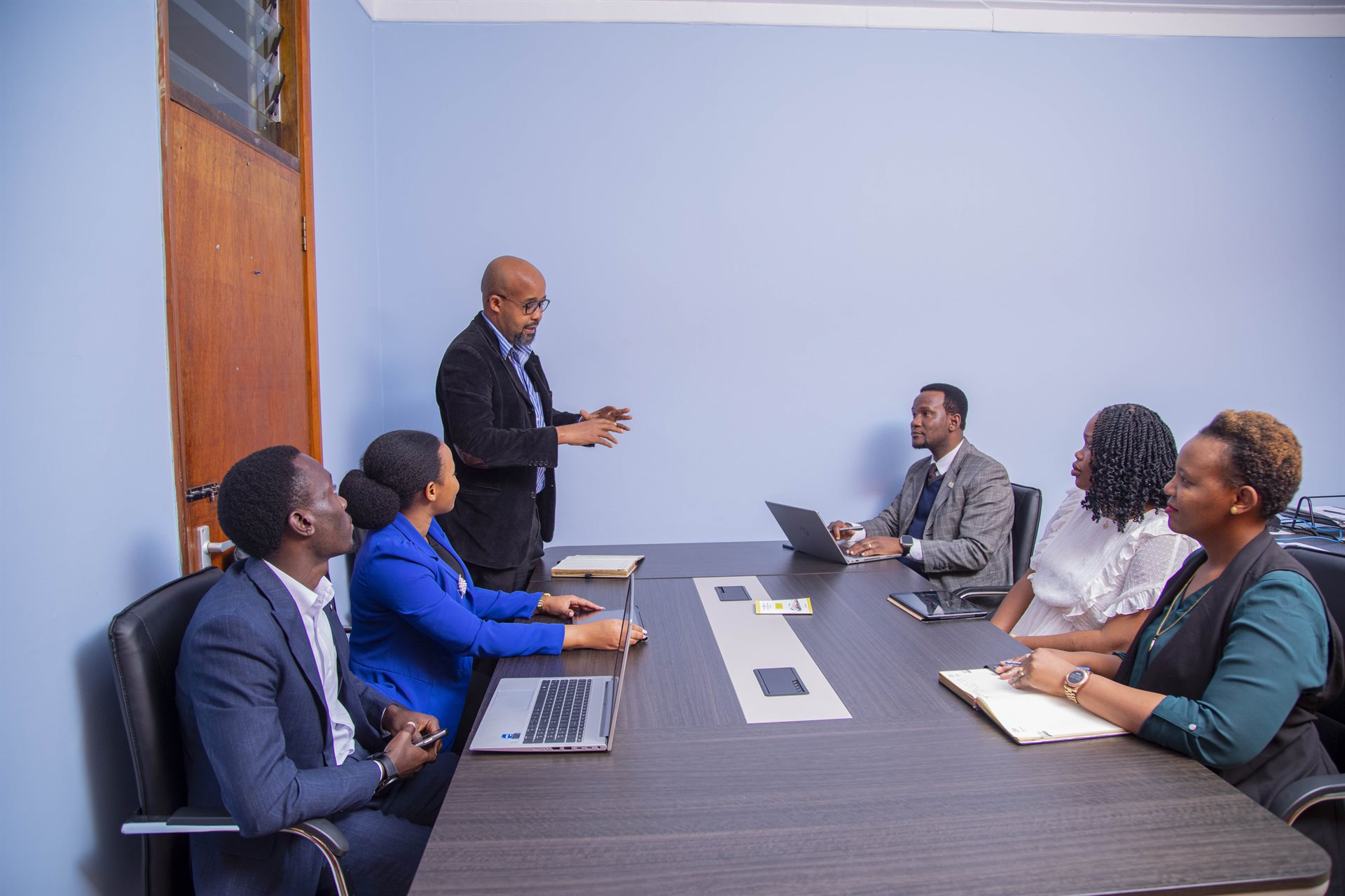 TUMA staff in a meeting